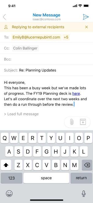 Shows a draft email with an alert about external recipients.
